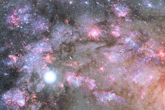 NASA Telescopes Uncover Early Construction of Giant Galaxy